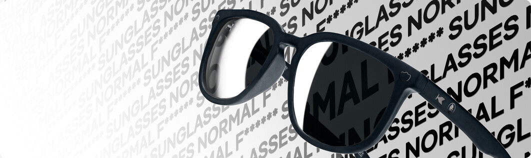 Knockaround sunglasses on a Normal F***ing Sunglasses backdrop